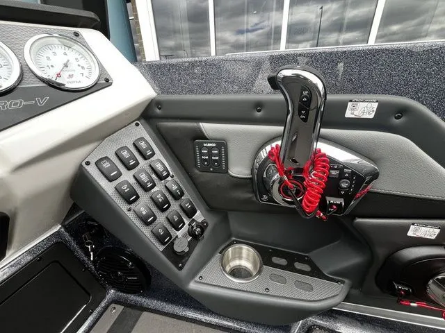 Slide: The Image of Interior view of 2026 Lund 202 PRO-V GL Sport boat cockpit. - 22