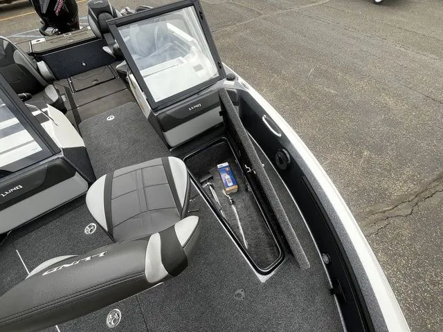 Slide: The Image of Interior of 2026 Lund 202 PRO-V GL Sport with storage compartment. - 26