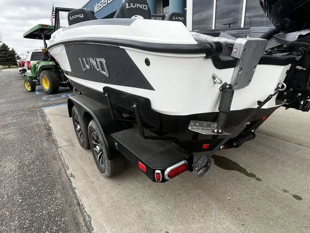 Slide: The Image of 2026 Lund 202 PRO-V GL Sport boat on trailer, side view. - 6