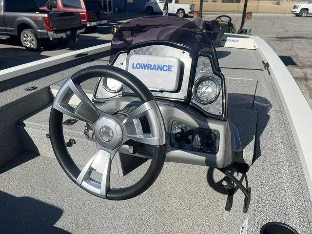 Slide: The Image of Steering wheel and dashboard of a 2020 G3 Sportsman 1710 boat. - 3