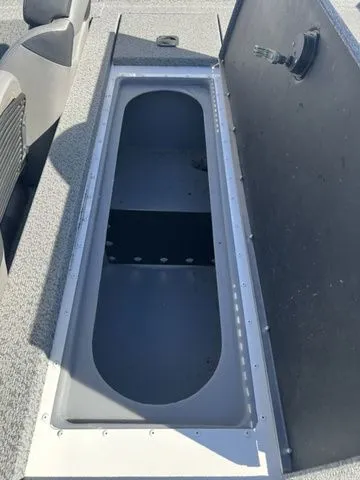 Slide: The Image of 2020 G3 Sportsman 1710 boat storage compartment open. - 7