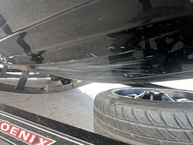 Slide: The Image of Scratches on the hull of a 2010 Phoenix 721 ProXP boat. - 10