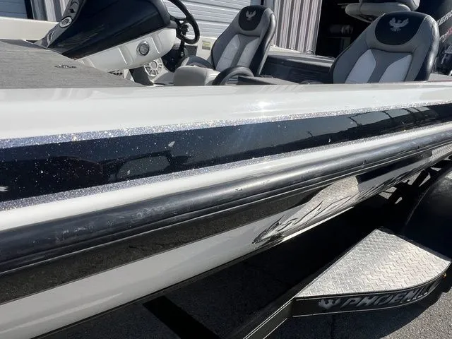 Slide: The Image of 2010 Phoenix 721 ProXP boat, close-up of hull and interior. - 13