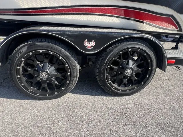 Slide: The Image of 2010 Phoenix 721 ProXP trailer with black rims. - 16