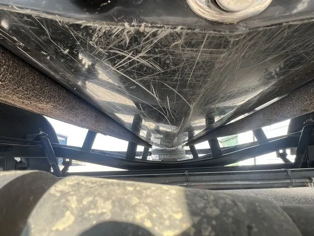 Slide: The Image of Underside of a 2010 Phoenix 721 ProXP boat on a trailer. - 18