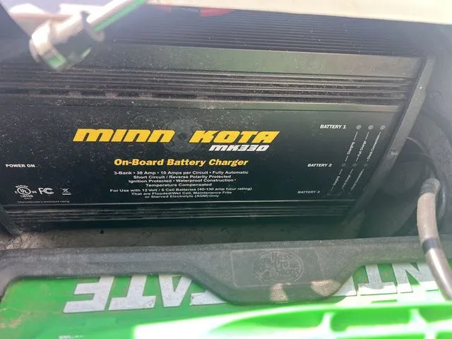 Slide: The Image of Minn Kota MK330 on-board battery charger in 2010 Phoenix 721 ProXP. - 23