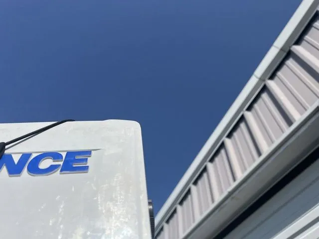 Slide: The Image of Close-up of Phoenix 721 ProXP boat detail, blue sky background. - 25