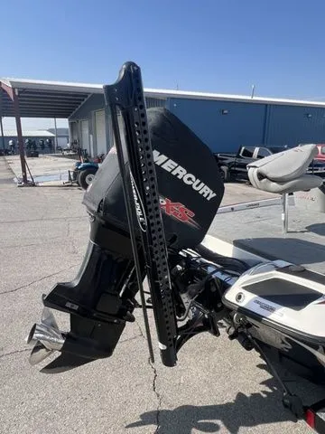Slide: The Image of 2010 Phoenix 721 ProXP boat with Mercury engine outdoors. - 4