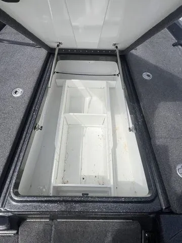 Slide: The Image of Storage compartment in Phoenix Bass Boats 921 Elite 2023 model. - 11