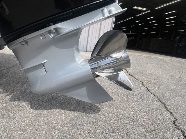 Slide: The Image of Close-up of a 2023 Phoenix Bass Boats 921 Elite propeller. - 17