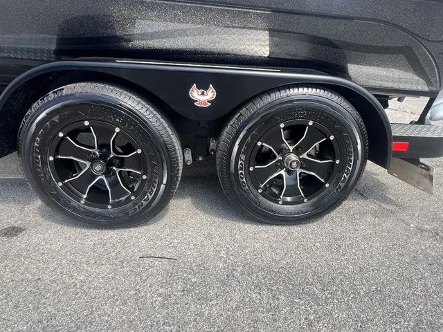 Slide: The Image of 2023 Phoenix Bass Boats 921 Elite trailer wheels and tires. - 18
