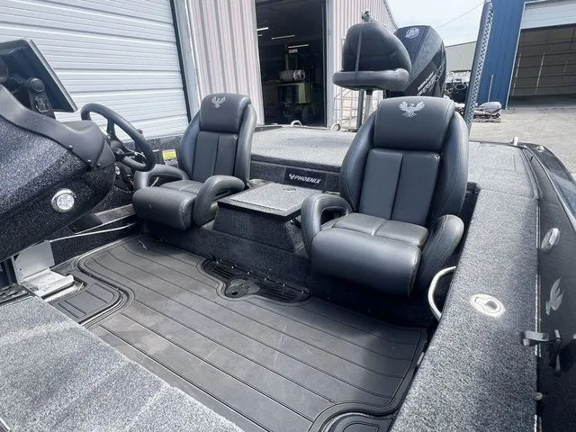 Slide: The Image of Interior of 2023 Phoenix Bass Boats 921 Elite with luxurious seating. - 5