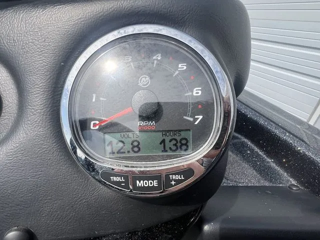 Slide: The Image of 2023 Phoenix Bass Boats 921 Elite tachometer showing 12.8 volts and 138 hours. - 8