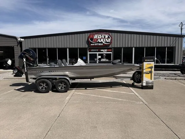 The Image of 2026 Xpress H20 boat in front of Jed's Marine store. - 1