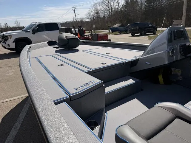 Slide: The Image of 2026 Xpress H20 boat with sleek design and spacious deck. - 12