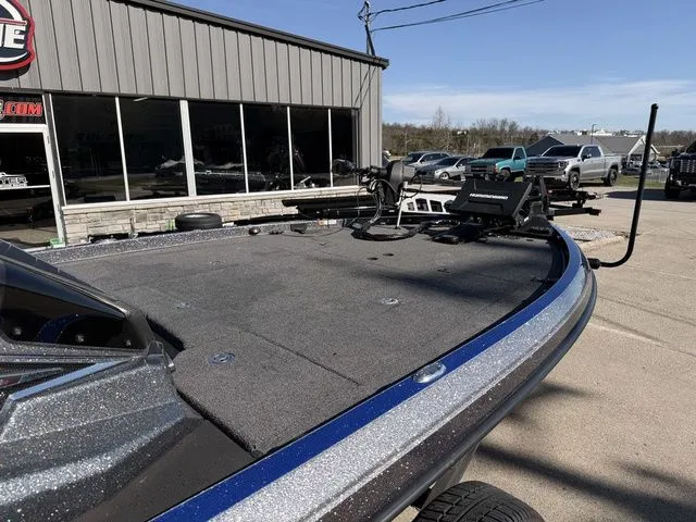 Slide: The Image of 2024 Ranger Z520R boat on parking lot in front of building. - 8