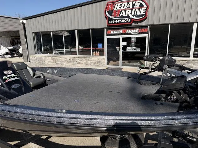 Slide: The Image of Phoenix 20phx 2021 boat in front of Weda's Marine store. - 10