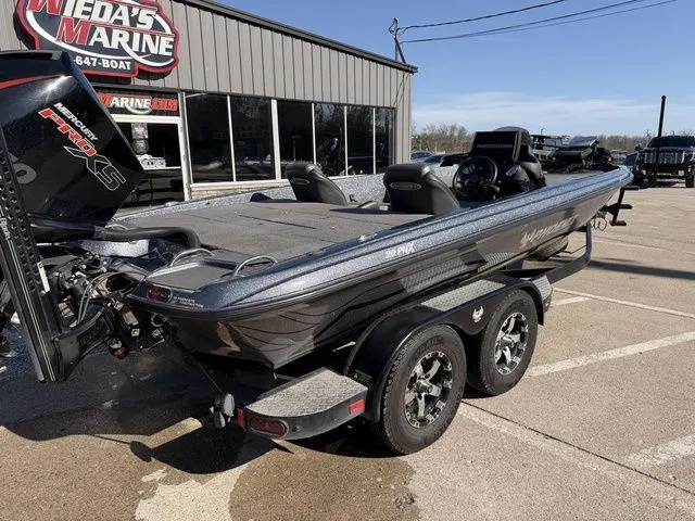 Slide: The Image of 2021 Phoenix 20phx boat parked outside a marine store. - 4