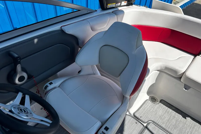 Slide: The Image of Interior of 2016 Chaparral 210 Suncoast boat with white and red seating. - 15