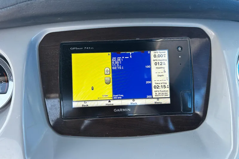 Slide: The Image of Garmin GPS display on 2016 Chaparral 210 Suncoast boat dashboard. - 22
