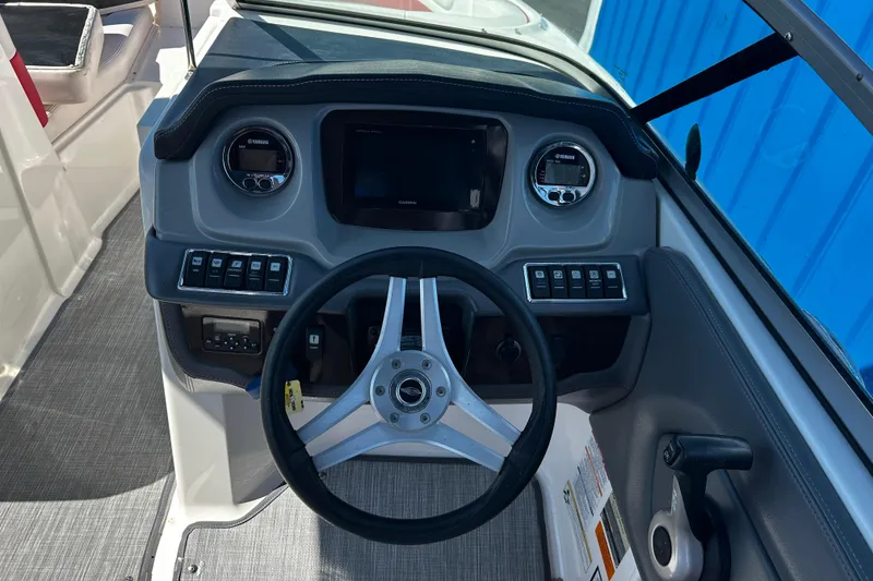Slide: The Image of Steering console of 2016 Chaparral 210 Suncoast boat with Yamaha controls. - 23