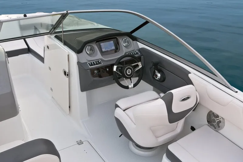 Slide: The Image of Manufacturer Provided Image: 2016 Chaparral 210 Suncoast boat interior with steering wheel and dashboard. - 37
