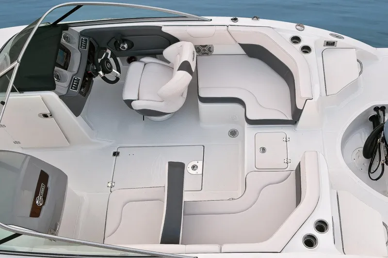 Slide: The Image of Manufacturer Provided Image: 2016 Chaparral 210 Suncoast boat interior with seating and helm. - 39
