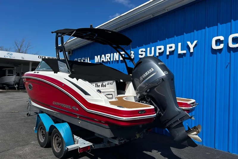 Slide: The Image of 2016 Chaparral 210 Suncoast boat with Yamaha engine at marine supply store. - 4
