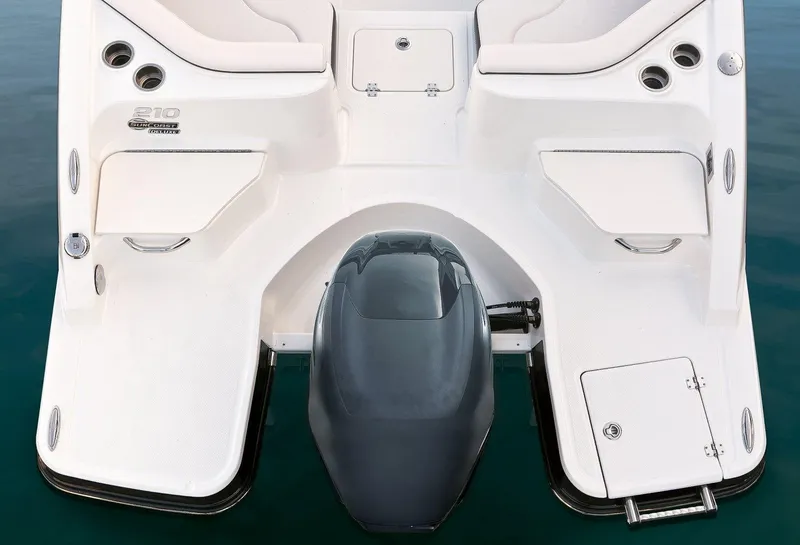 Slide: The Image of Manufacturer Provided Image: 2016 Chaparral 210 Suncoast boat stern with outboard motor and swim platform. - 40