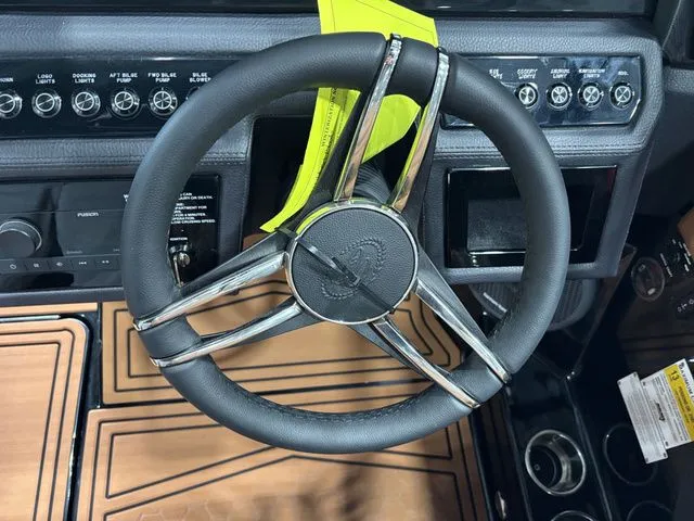 Slide: The Image of Steering wheel of 2026 Cobalt R4 Surf with modern controls. - 14