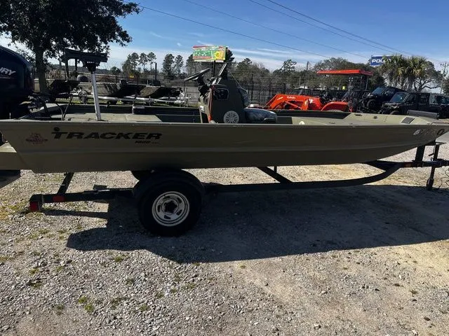Slide: The Image of 2021 Tracker TRACKER 1860 MVX boat on trailer outdoors. - 3