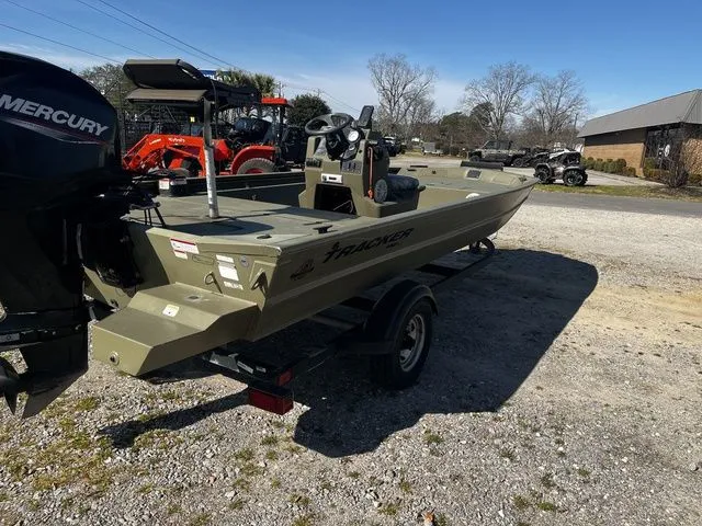 Slide: The Image of 2021 Tracker TRACKER 1860 MVX boat on trailer outdoors. - 4