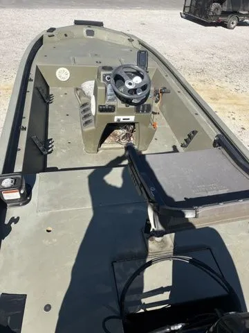 Slide: The Image of 2021 Tracker TRACKER 1860 MVX boat interior with steering console. - 7