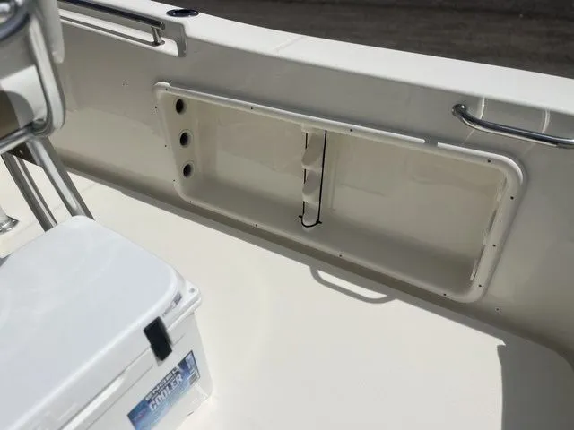 Slide: The Image of Interior view of 2026 Bulls Bay 230CC boat with storage compartment. - 18