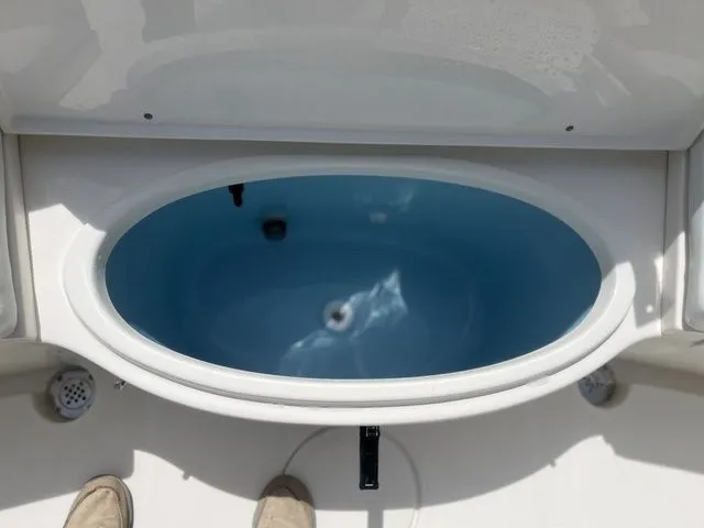Slide: The Image of Interior view of 2026 Bulls Bay 230CC boat, oval compartment. - 19
