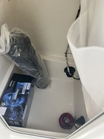 Slide: The Image of Storage compartment in Bulls Bay 230CC boat with accessories. - 23