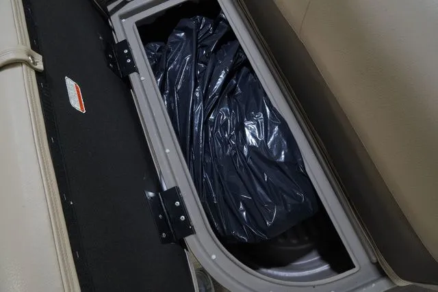 Slide: The Image of Storage compartment in Sun Tracker Bass Buggy® 16 XL, 2020 model. - 17