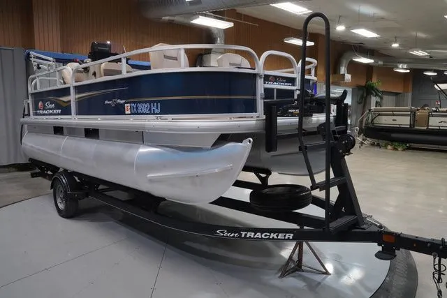 Slide: The Image of 2020 Sun Tracker Bass Buggy® 16 XL pontoon boat on trailer. - 4
