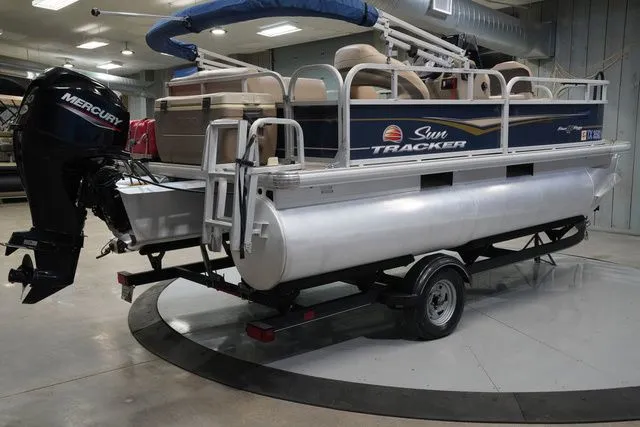 Slide: The Image of 2020 Sun Tracker Bass Buggy 16 XL pontoon boat in warehouse. - 6