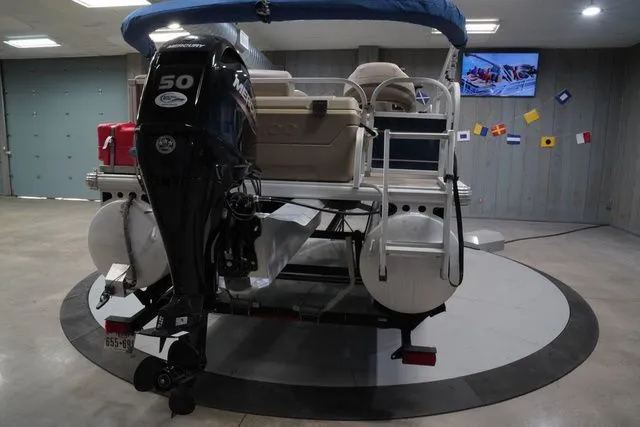 Slide: The Image of 2020 Sun Tracker Bass Buggy® 16 XL pontoon boat indoors. - 7