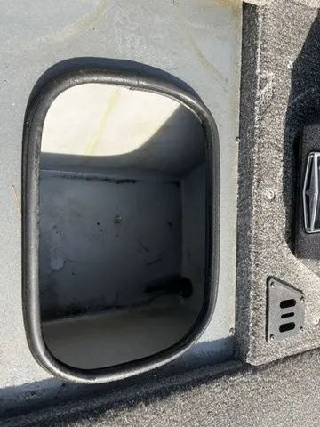 Slide: The Image of Ranger RT188P 2021 boat storage compartment with carpeted interior. - 11