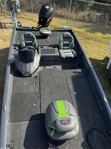 Slide: The Image of 2021 Ranger RT188P boat with gray and green seats. - 8