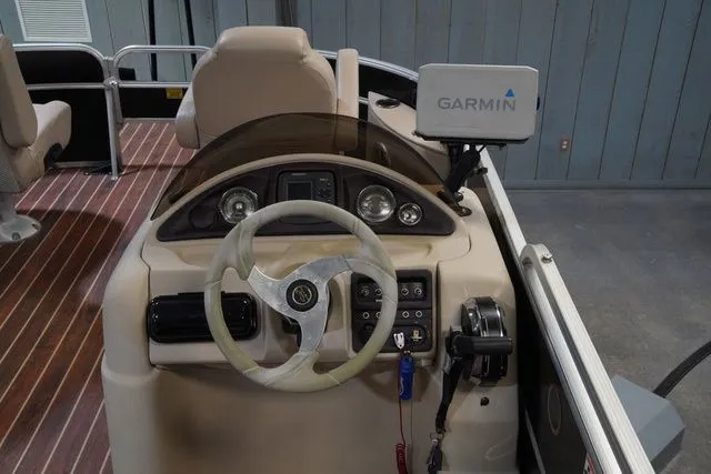Slide: The Image of 2015 South Bay 424FCR boat helm with Garmin navigation system. - 17