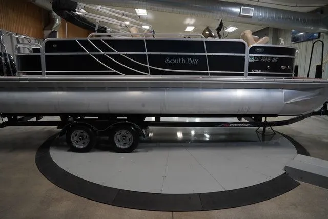 Slide: The Image of 2015 South Bay 424FCR pontoon boat on trailer indoors. - 6