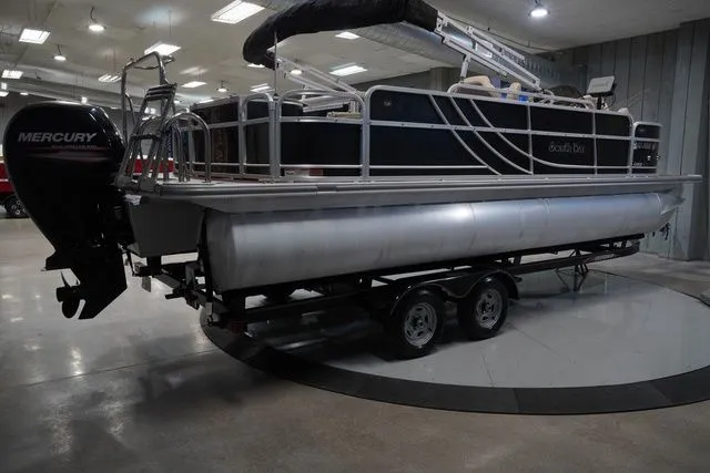 Slide: The Image of 2015 South Bay 424FCR pontoon boat on trailer indoors. - 7