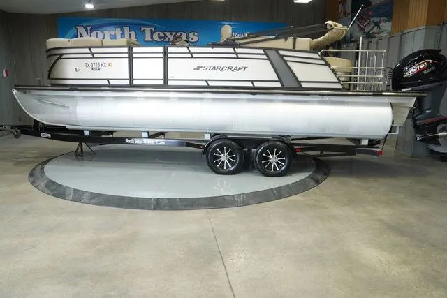 The Image of 2024 Starcraft SLS 3 Q DH pontoon boat in showroom. - 1