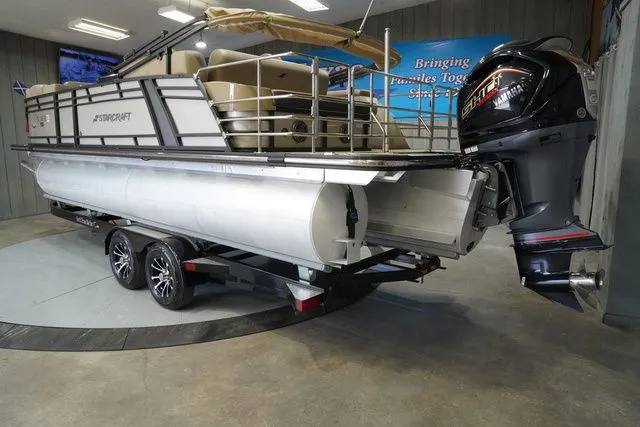Slide: The Image of 2024 Starcraft SLS 3 Q DH pontoon boat in showroom - 10