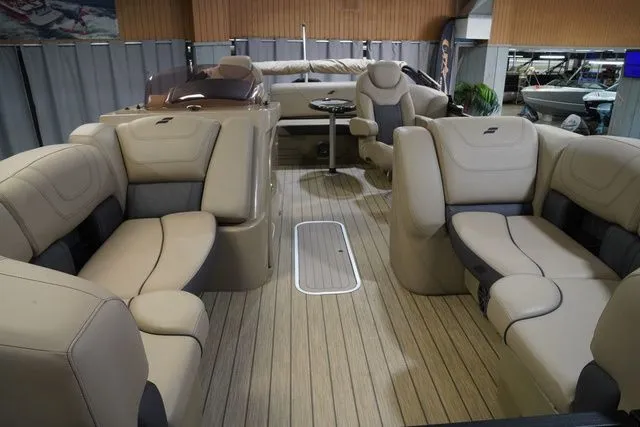 Slide: The Image of Interior of 2024 Starcraft SLS 3 Q DH boat with luxurious seating. - 11