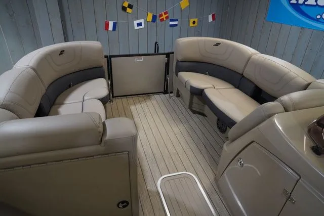 Slide: The Image of Interior of 2024 Starcraft SLS 3 Q DH with beige leather seating. - 12