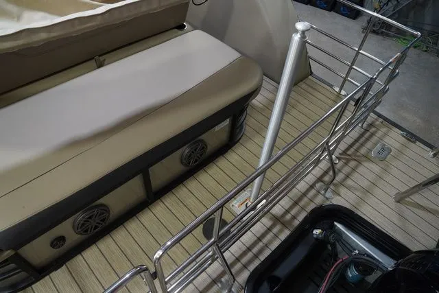 Slide: The Image of Interior of 2024 Starcraft SLS 3 Q DH with seating and railing. - 22